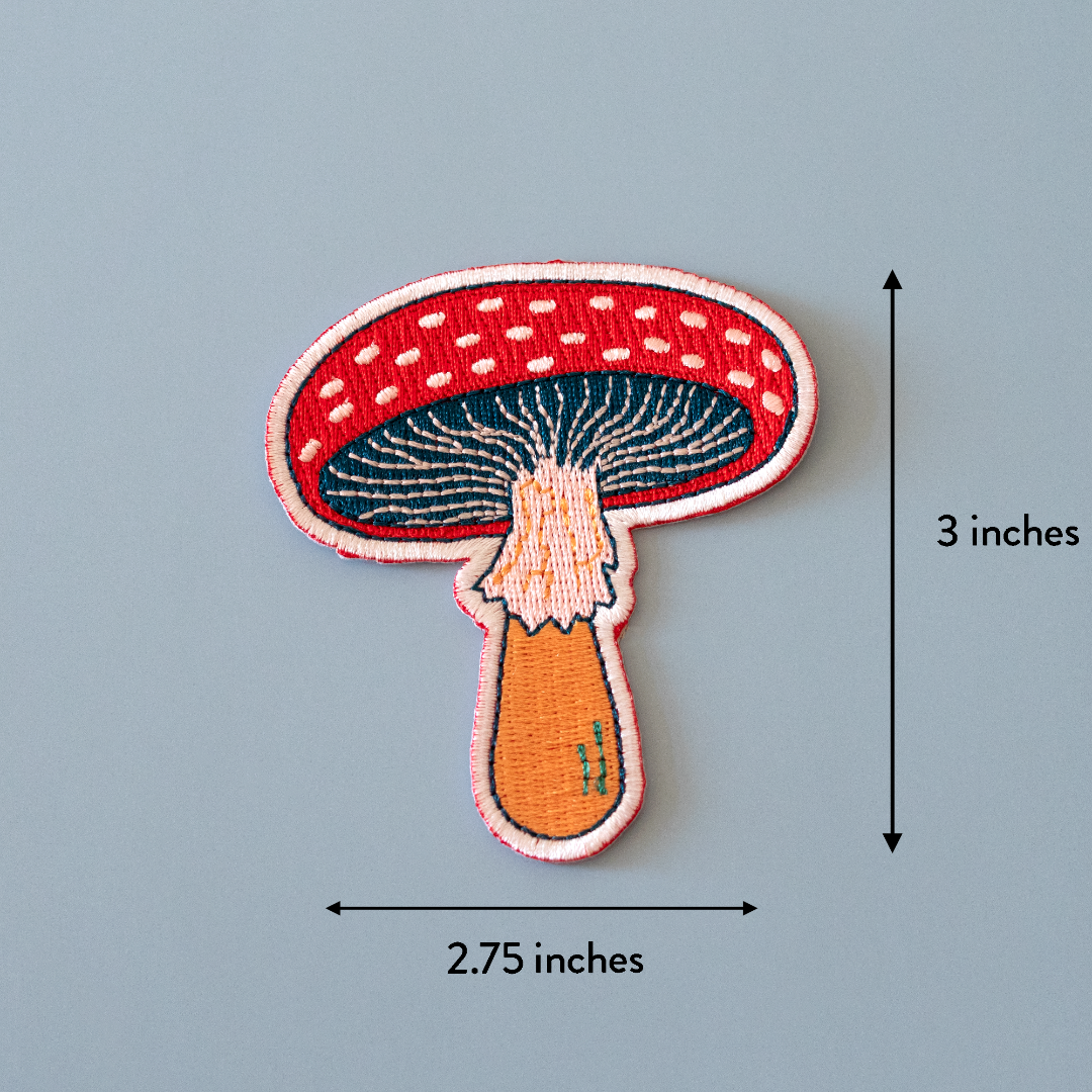 Mushroom-shaped patch with dimensions on a gray background