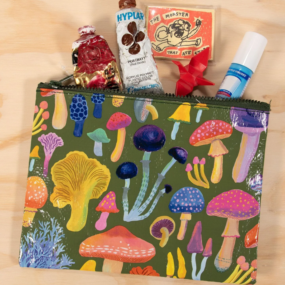 A green zippered pouch covered in a colorful mushroom pattern. The mushrooms are in various shapes, sizes, and colors, with some featuring dots or stripes.