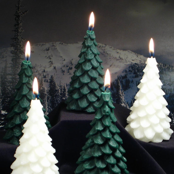 A green, beeswax candle shaped like a Christmas tree. The candle has detailed branches and a pointed top.