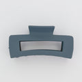 Gray hair clip on a white background