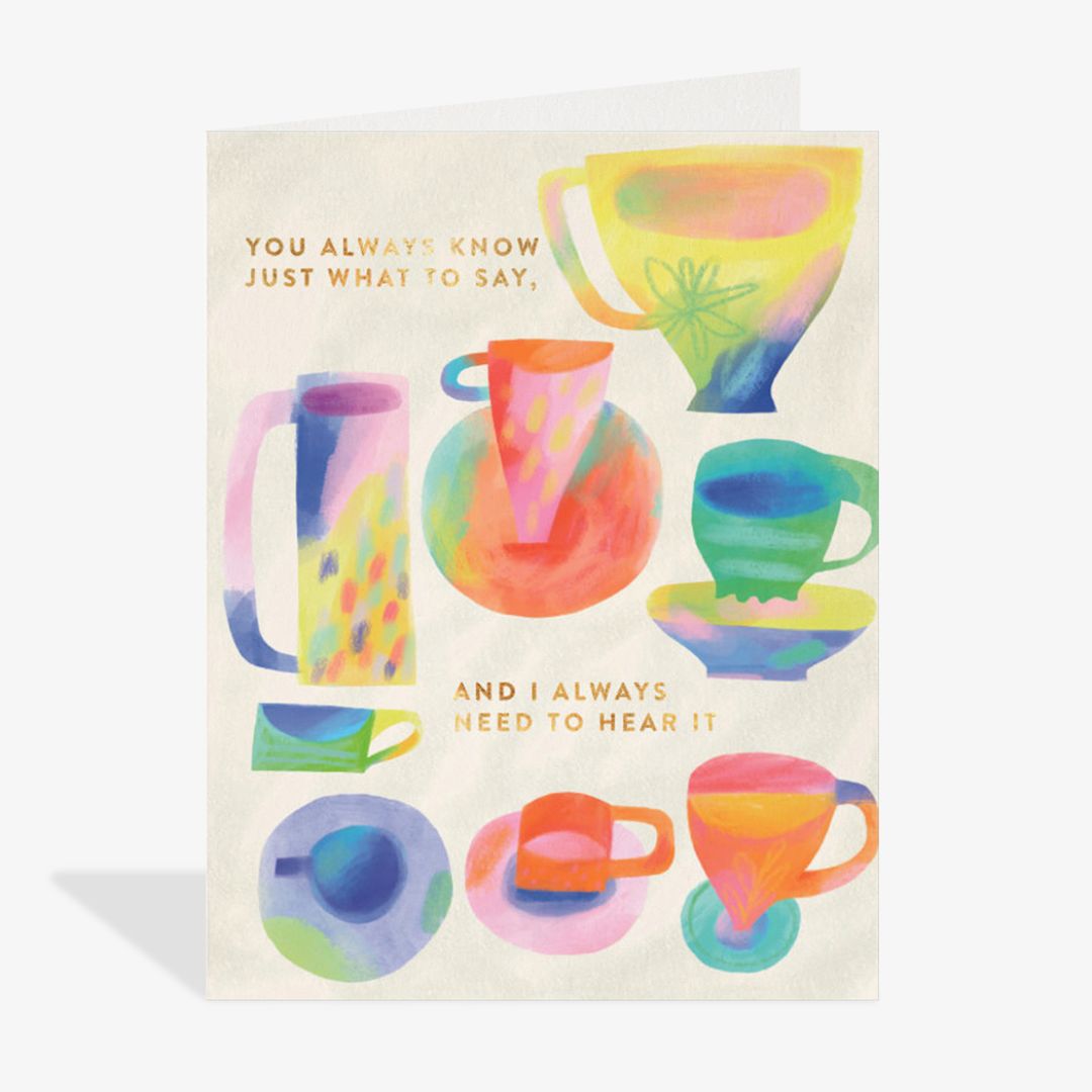 Colorful card with watercolor teacups and text on a white background