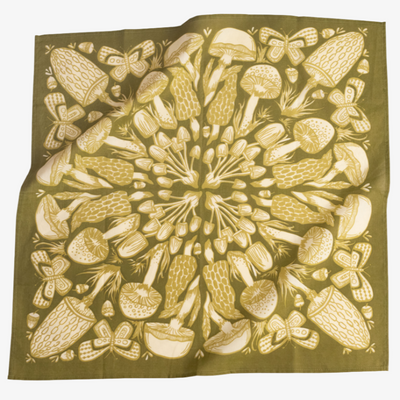 Green fabric square with white mushroom pattern