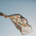 A navy blue bandana with a floral pattern. The pattern features stylized flowers, leaves, and berries in shades of yellow, orange, and pink.