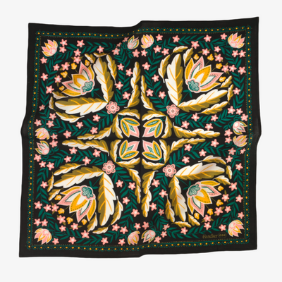 Decorative blanket with floral pattern on a black background
