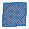 A blue bandana with a floral pattern. The pattern features small red flowers with white centers and white leaves.