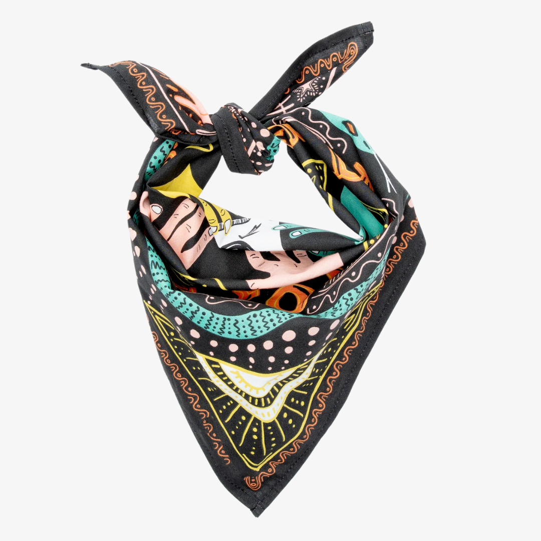 A black bandana with a mystical pattern. The pattern features a Ouija board design with hands pointing to letters and numbers, along with celestial symbols like moons and stars.