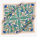 A pink bandana with a floral pattern. The pattern features blue and yellow dandelions with green leaves. The border of the bandana has a decorative, repeating pattern.