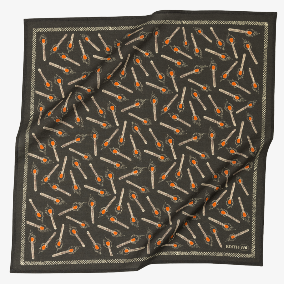 Black scarf with a pattern of matches on a white background