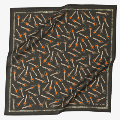 Black scarf with a pattern of matches on a white background