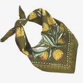 Green bandana with floral pattern on a white background