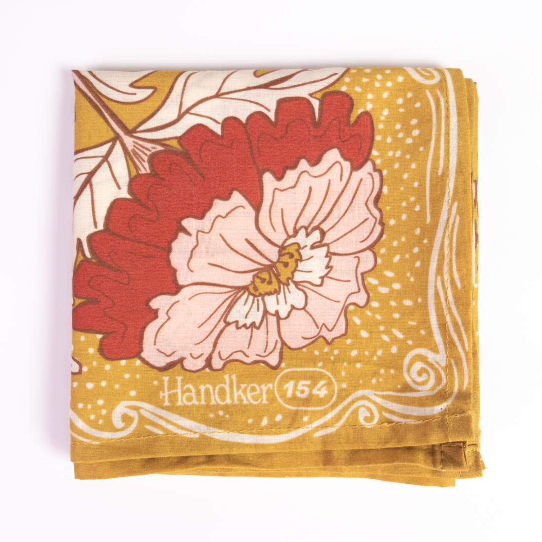 Floral patterned handkerchief with 'Handler 154' branding on a yellow background