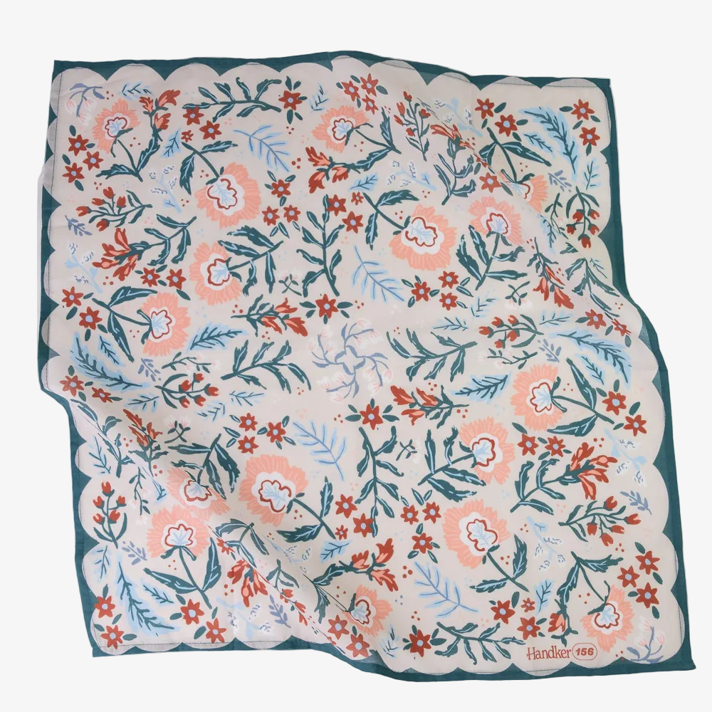 Floral patterned fabric with pink and blue flowers on a white background