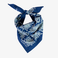 Blue bandana with white floral pattern on a white background