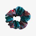 Plaid patterned scrunchie on a white background