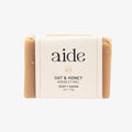 Bar of soap with 'aide' branding on a white background