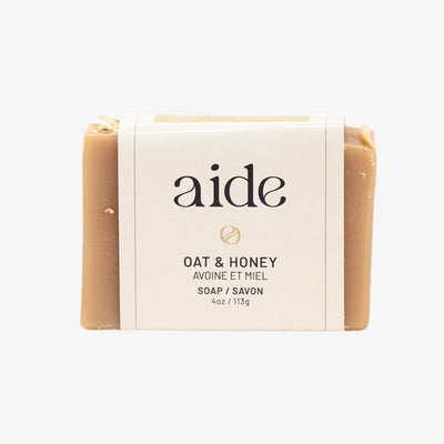 Bar of soap with 'aide' branding on a white background