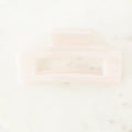 Close-up of a white plate with a blurred background