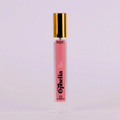 A bottle of Charleston & Harlow perfume named "Ophelia." The bottle is clear glass with a gold spray cap. The label is pink with the brand name and perfume name in a bold, playful font. The fragrance notes are listed as "Spice, Vanilla, Tobacco."
