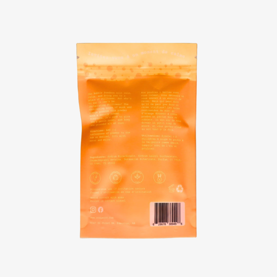 Orange packaging with text and a barcode on a black background