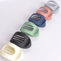 Set of colorful hair clips on a white background