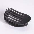 Black plastic component on a white background