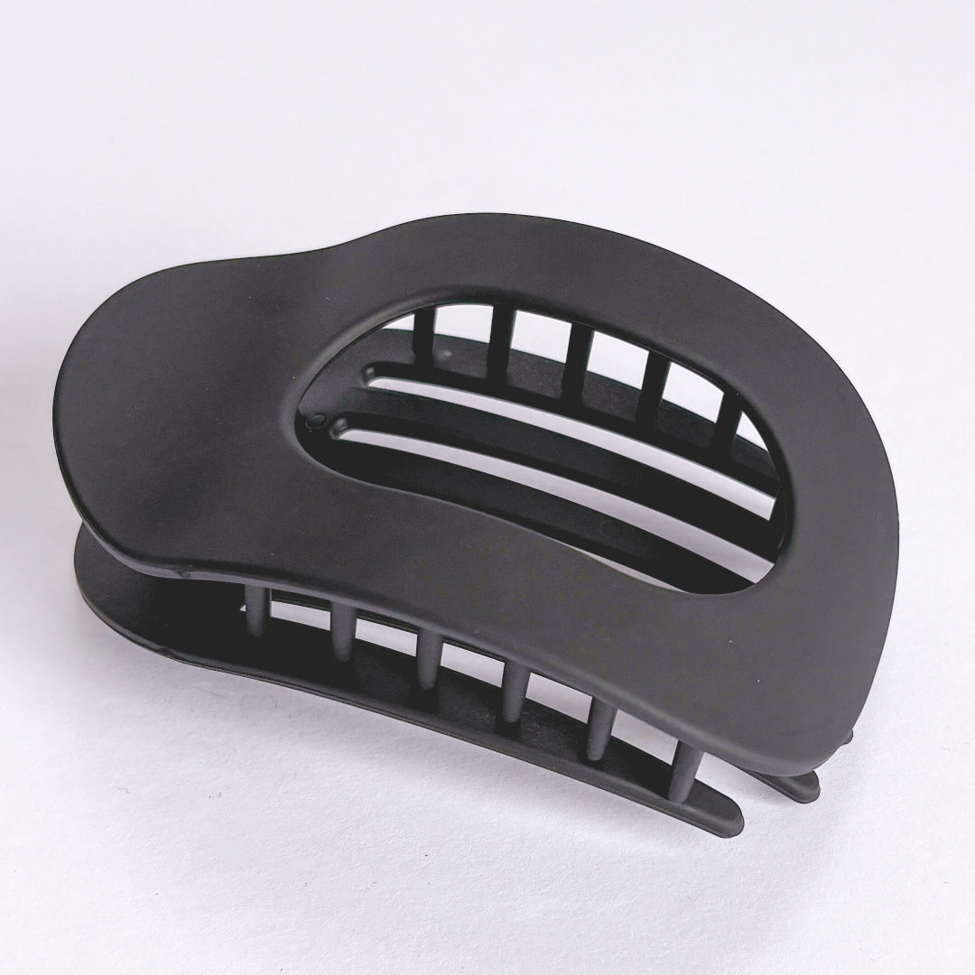 Black hair clip on a white background