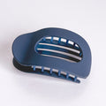 Blue plastic soap dish on a white background