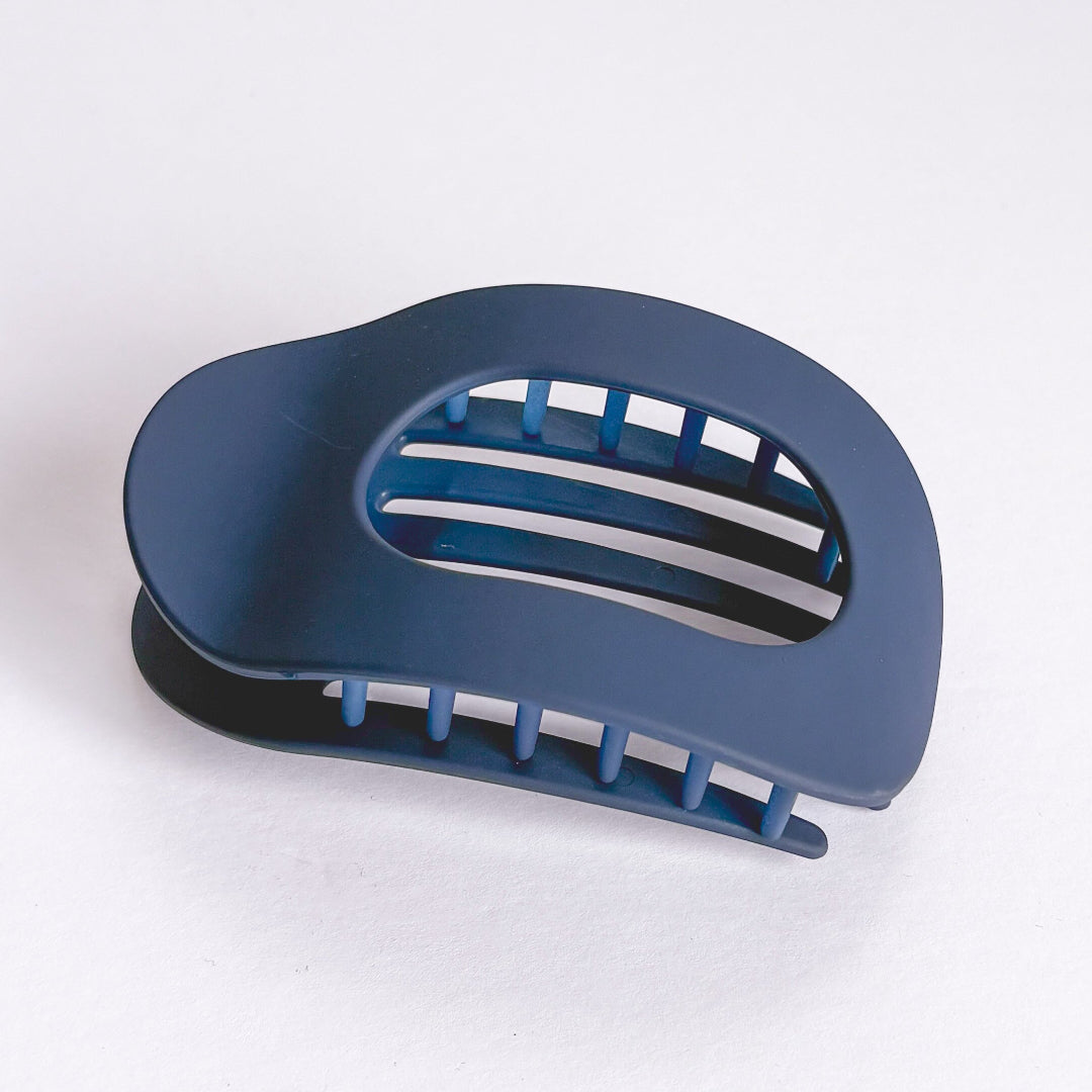 Blue plastic soap dish on a white background