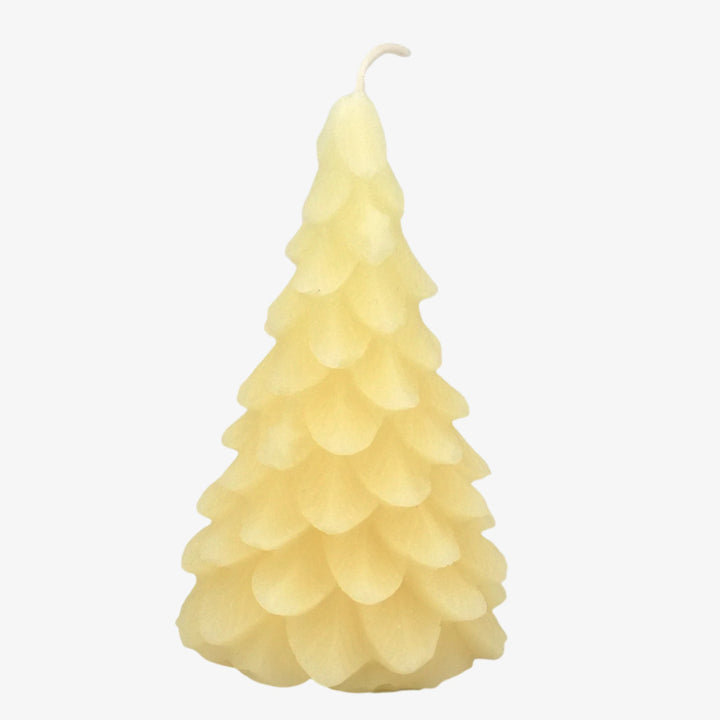 A white, beeswax candle shaped like a Christmas tree. The candle has detailed branches and a pointed top.