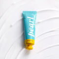 Avry Beauty pearl hand cream tube on a white background