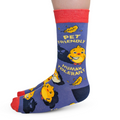 Sock with cartoon characters and text on a white background