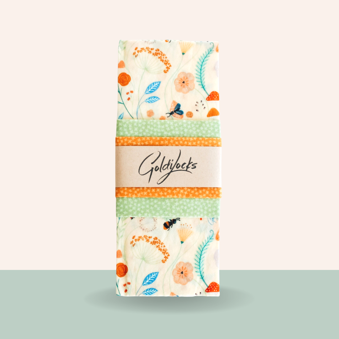 Pack of Goldylocks tissues with floral design on a light green background
