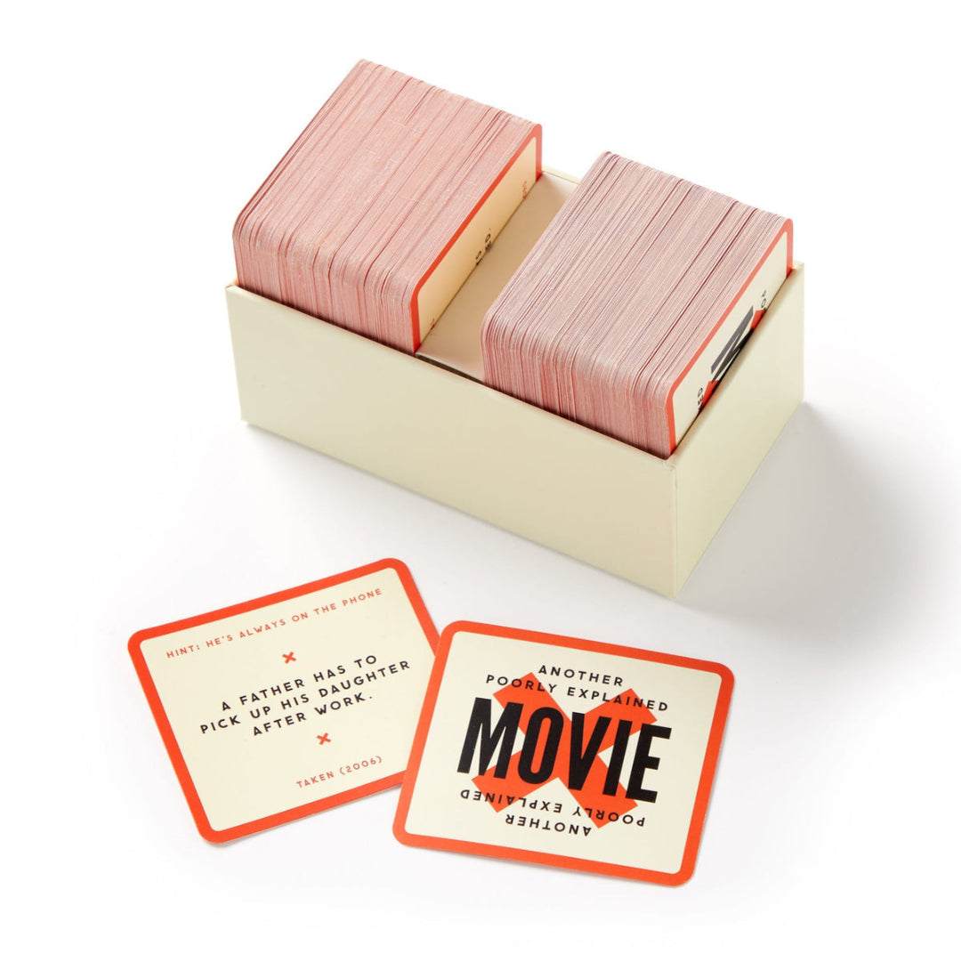 Set of playing cards with red and beige design in a box on a white background