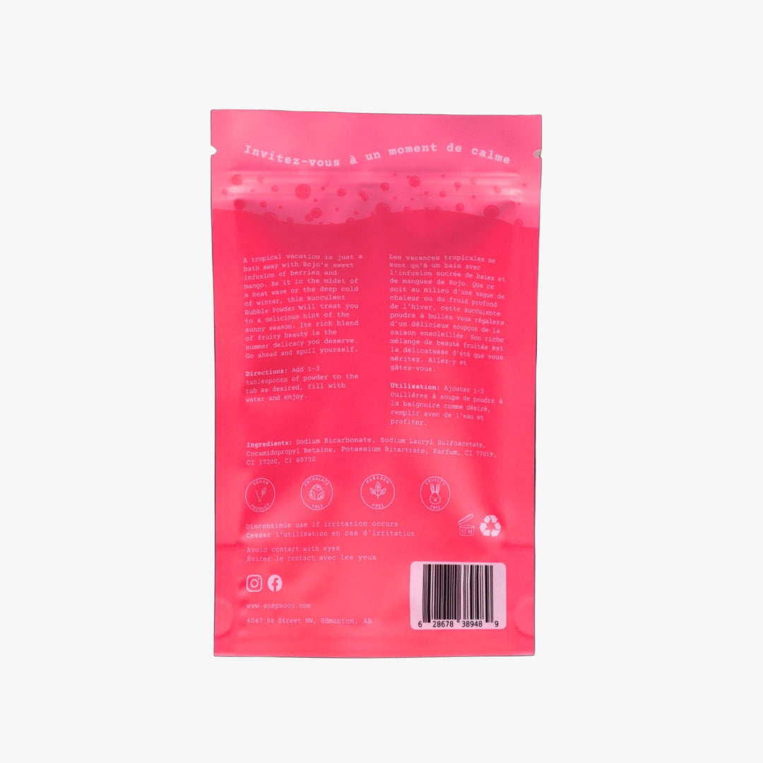 Pink packaging with text and a barcode on a black background