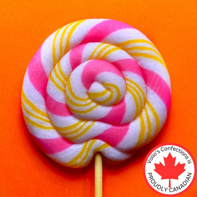Pink, white, and yellow striped lollipop on an orange background with Vollo's Confections logo.
