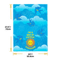 Blue towel with cartoon birds and sun design, featuring text and measurements.