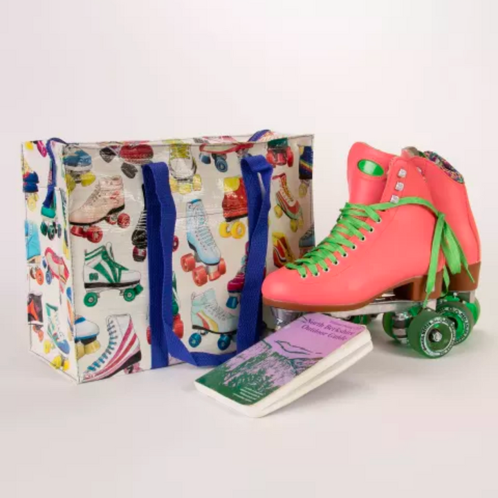 A large tote bag with a playful roller skate pattern. The bag is white with a variety of colorful roller skates printed all over it. The skates are in different styles and colors, and some have laces while others have buckles. The bag has blue handles.