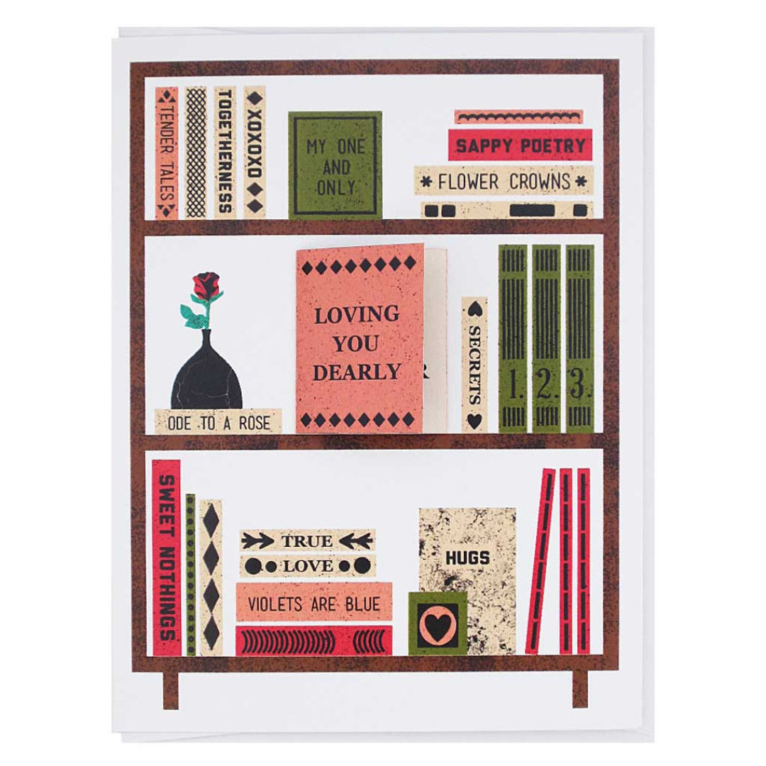 Decorative shelf with books and phrases on a white background