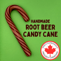 Handmade root beer candy cane with Volos Confections logo on a green background