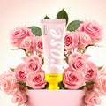 Skincare product with 'Rose' branding surrounded by pink roses on a light pink background