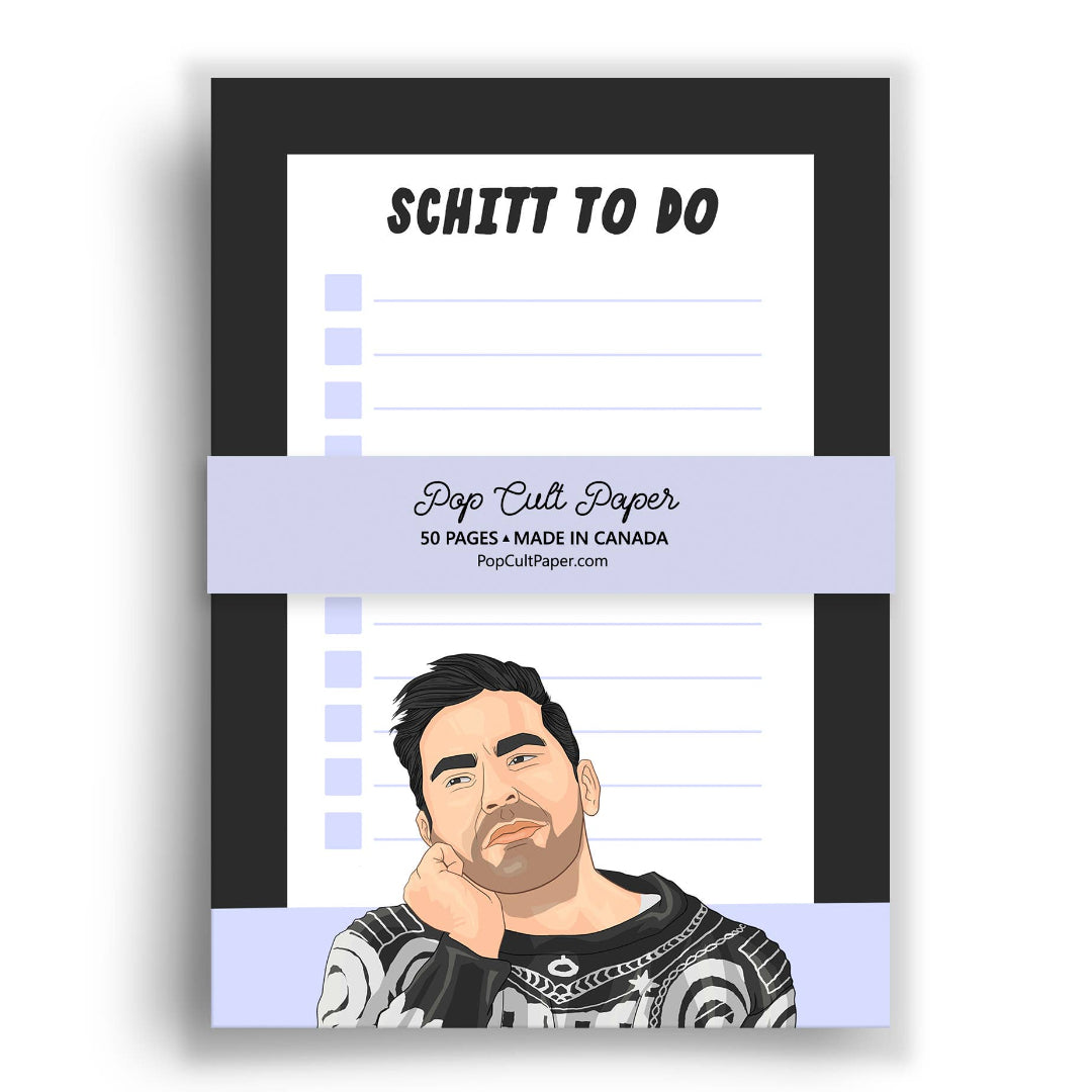Notebook with a cartoon character on the cover, featuring the text 'Schitt to Do' and 'Pop Cult Paper'.
