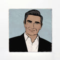 A square art print or tile featuring a stylized illustrated portrait of a man with dark hair, wearing a black suit jacket and white shirt against a light blue-gray background, shown on a white surface.
