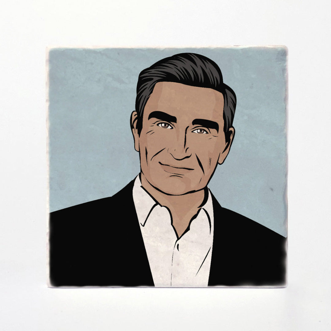 A square art print or tile featuring a stylized illustrated portrait of a man with dark hair, wearing a black suit jacket and white shirt against a light blue-gray background, shown on a white surface.