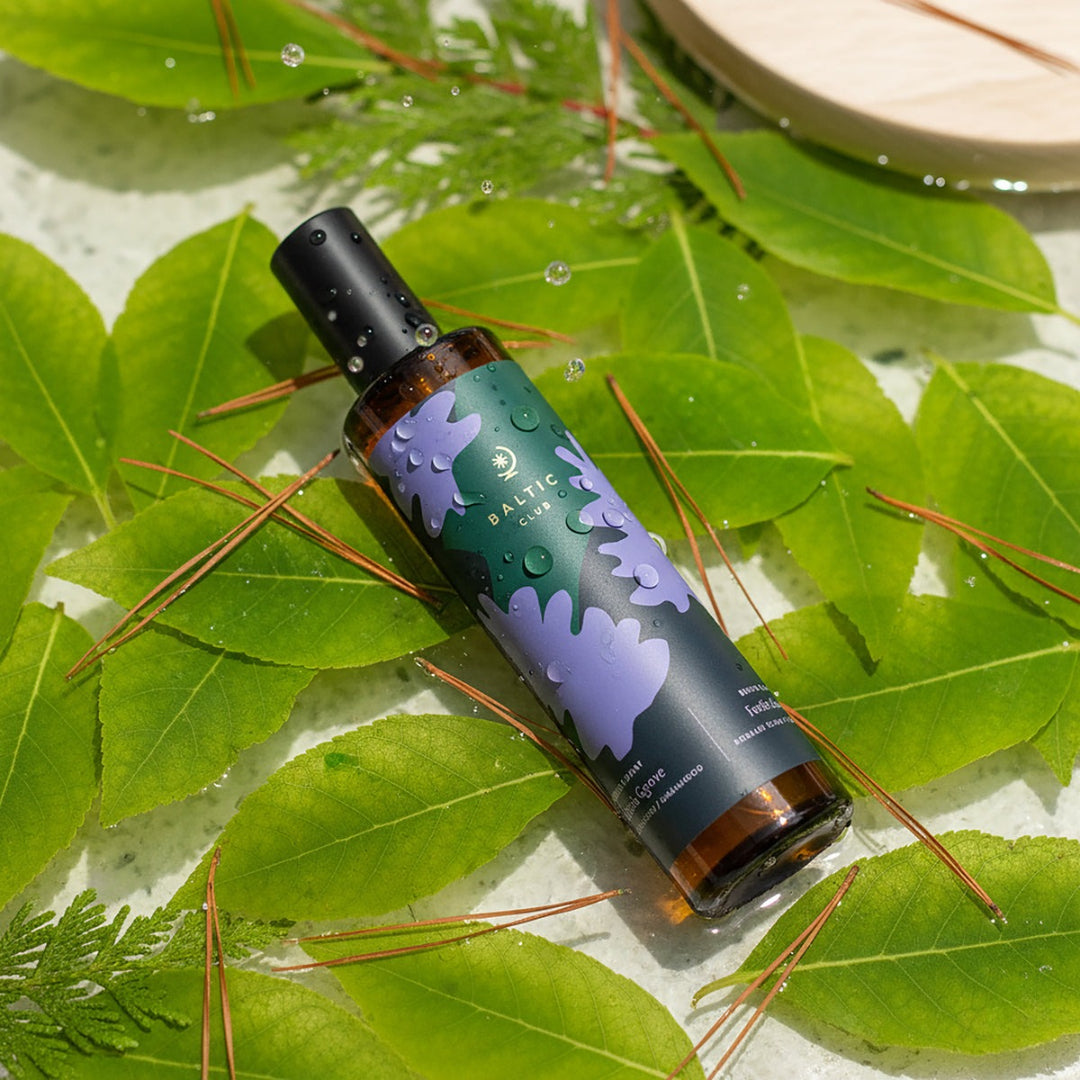 Bottle of Balter Co. product on green leaves with a natural background