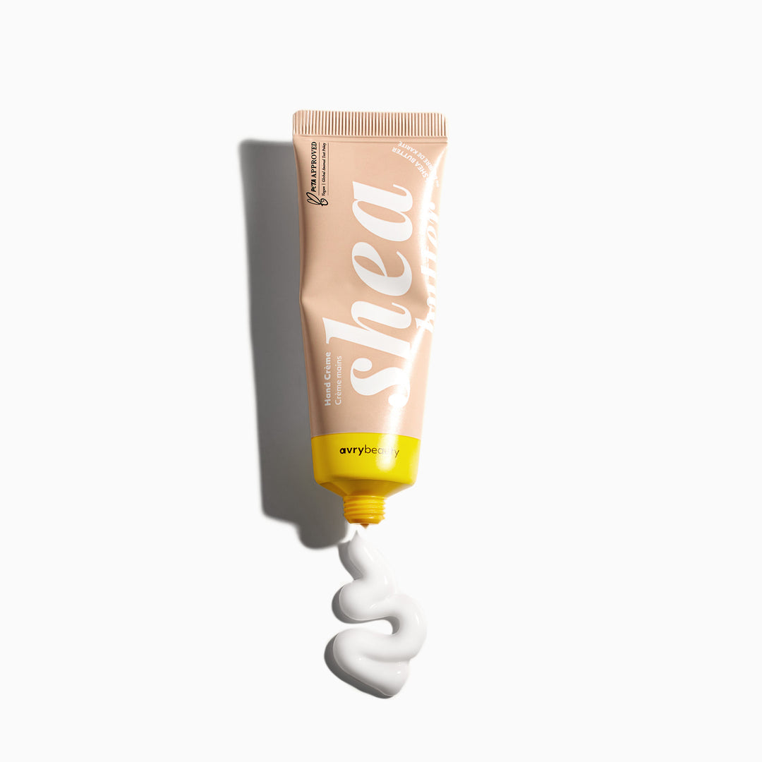 Shea butter tube with a white cream swirl on a white background