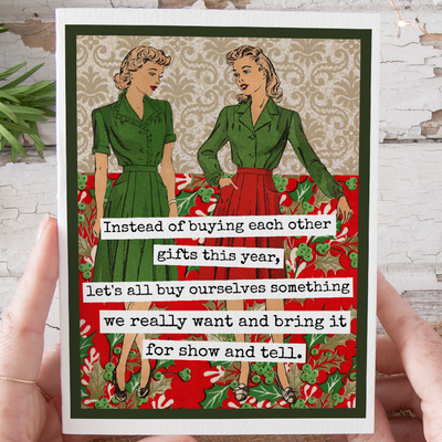 Card with vintage-style illustration of two women in green dresses on a red and green patterned background.