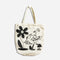A white tote bag with a black and white illustration. The illustration shows a goose pouring coffee on a flower with a smiley face. The text 