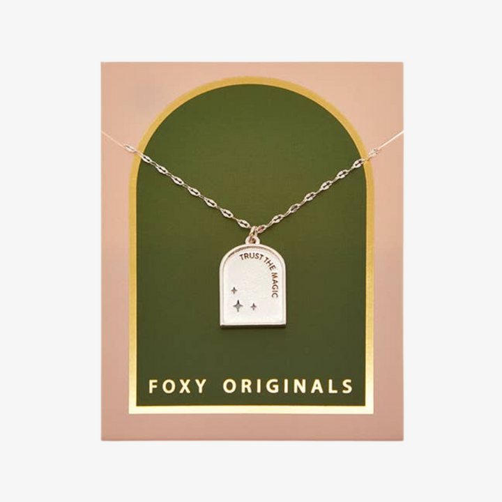 A silver necklace with a pendant shaped like an archway. The pendant has the words 