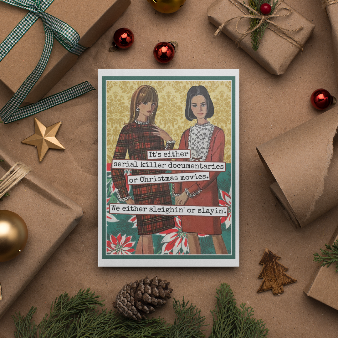 Card with two women on a Christmas-themed background surrounded by gift wraps and ornaments.