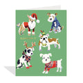 Card with illustrations of dogs in festive costumes on a green background